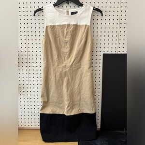 The Limited Dress 
Color block design with zippered back
Size 0
